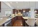 Spacious kitchen with granite countertops and stainless steel appliances at 821 Blackfriars Loop, Cary, NC 27519