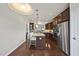 Modern kitchen with stainless steel appliances and island at 821 Blackfriars Loop, Cary, NC 27519