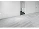 Spacious bedroom with neutral carpeting and a view into the attached bathroom at 1029 Dillon Lake Dr, Knightdale, NC 27545