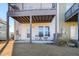 Ground level patio and backyard with access from sliding glass door at 1040 Myers Point Dr, Morrisville, NC 27560