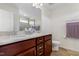 Elegant bathroom with double vanity and a large mirror at 1040 Myers Point Dr, Morrisville, NC 27560