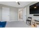 Versatile bedroom with plenty of space and a large TV at 1040 Myers Point Dr, Morrisville, NC 27560