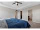 Bright bedroom featuring a walk-in closet and ensuite bathroom at 1040 Myers Point Dr, Morrisville, NC 27560