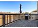 Spacious deck with built-in grill and umbrella, overlooking tranquil pond at 1040 Myers Point Dr, Morrisville, NC 27560