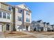 Modern townhome community with inviting streetscape and attractive landscaping at 1040 Myers Point Dr, Morrisville, NC 27560