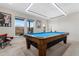 Game room featuring a pool table and plenty of natural light from large windows at 1040 Myers Point Dr, Morrisville, NC 27560