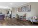 Bright living room with hardwood floors and built-in shelving, offering an open floor plan at 1040 Myers Point Dr, Morrisville, NC 27560