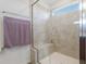 Modern shower with tiled walls and a built-in seat at 1040 Myers Point Dr, Morrisville, NC 27560