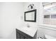 Bathroom with vanity and mirror at 105 Cooke St, Raleigh, NC 27601
