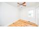 Bright bedroom with hardwood floors and ceiling fan at 105 Cooke St, Raleigh, NC 27601