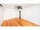 Bright bedroom with hardwood floors and access to hallway at 105 Cooke St, Raleigh, NC 27601