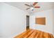 Bright bedroom with hardwood floors and ceiling fan at 105 Cooke St, Raleigh, NC 27601