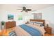 Well-lit bedroom with hardwood floors and ceiling fan at 105 Cooke St, Raleigh, NC 27601