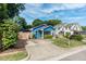 Cute blue house with driveway and fenced yard at 105 Cooke St, Raleigh, NC 27601