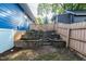 Landscaped backyard with tiered garden at 105 Cooke St, Raleigh, NC 27601
