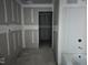 Unfinished bathroom with drywall and bathtub at 105 Forest Dr, Graham, NC 27253