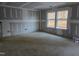 Unfinished bedroom with two windows, new construction at 105 Forest Dr, Graham, NC 27253