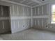 Unfinished bedroom with drywall and window at 105 Forest Dr, Graham, NC 27253