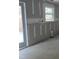 Unfinished kitchen area with exterior access at 105 Forest Dr, Graham, NC 27253