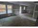 Spacious living room with large windows, unfinished at 105 Forest Dr, Graham, NC 27253