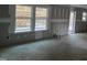 Unfinished living room with large windows at 105 Forest Dr, Graham, NC 27253
