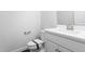 Clean and modern bathroom with white vanity and quartz countertop at 1099 Talisker Way, Burlington, NC 27215
