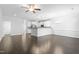 Open concept kitchen with island, stainless steel appliances, and white cabinetry at 1099 Talisker Way, Burlington, NC 27215