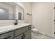 Simple bathroom with single vanity, gray cabinets, and white countertop at 1523 Alta Vista Ln, Graham, NC 27253