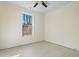 Bright bedroom with light wood flooring and a large window at 1523 Alta Vista Ln, Graham, NC 27253