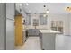Modern gray kitchen with island and deck access at 1523 Alta Vista Ln, Graham, NC 27253