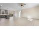 Open living space with hardwood floors and modern ceiling fan at 1523 Alta Vista Ln, Graham, NC 27253