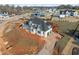 New construction home with white siding and gray roof at 1608 Legacy Ridge Ln, Wake Forest, NC 27587