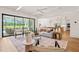 Open concept living room with large sliding doors leading to an outdoor patio at 1608 Legacy Ridge Ln, Wake Forest, NC 27587