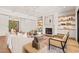 Cozy living room with fireplace, built-in shelves, and stylish decor at 1608 Legacy Ridge Ln, Wake Forest, NC 27587
