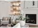 Stylish living room featuring a fireplace with built-in shelving at 1608 Legacy Ridge Ln, Wake Forest, NC 27587