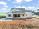 New home under construction with a large covered patio at 1609 Legacy Ridge Ln, Wake Forest, NC 27587