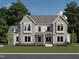 Two-story home with gray siding, shutters, and a covered porch at 1609 Legacy Ridge Ln, Wake Forest, NC 27587