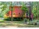 Home's exterior featuring a wood deck, a well maintained yard, and natural surroundings for outdoor enjoyment at 211 Dwelling Pl, Knightdale, NC 27545