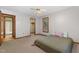 Bedroom showing a closet, bathroom and a large window for natural light at 211 Dwelling Pl, Knightdale, NC 27545