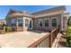 Spacious patio with a wooden fence and lighting at 257 Macallan Dr, Burlington, NC 27215