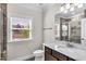 Clean bathroom with single vanity, toilet and shower at 257 Macallan Dr, Burlington, NC 27215