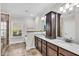 Elegant bathroom with double vanity, large mirror, and a separate shower at 257 Macallan Dr, Burlington, NC 27215
