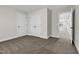 Bright bedroom with double doors and carpet at 257 Macallan Dr, Burlington, NC 27215