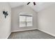 Bright bedroom featuring a large window and carpeted floor at 257 Macallan Dr, Burlington, NC 27215