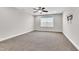Spacious bedroom with ceiling fan and window coverings at 257 Macallan Dr, Burlington, NC 27215
