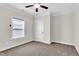 Charming bedroom with ceiling fan and window coverings at 257 Macallan Dr, Burlington, NC 27215