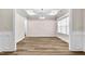 Bright dining room features hardwood floors and recessed lighting at 257 Macallan Dr, Burlington, NC 27215