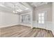 Formal dining room featuring wood floors and a coffered ceiling at 257 Macallan Dr, Burlington, NC 27215