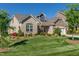 Brick house with a two-car garage and lush landscaping at 257 Macallan Dr, Burlington, NC 27215