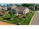 Home exterior showcasing landscaping and patio at 257 Macallan Dr, Burlington, NC 27215
